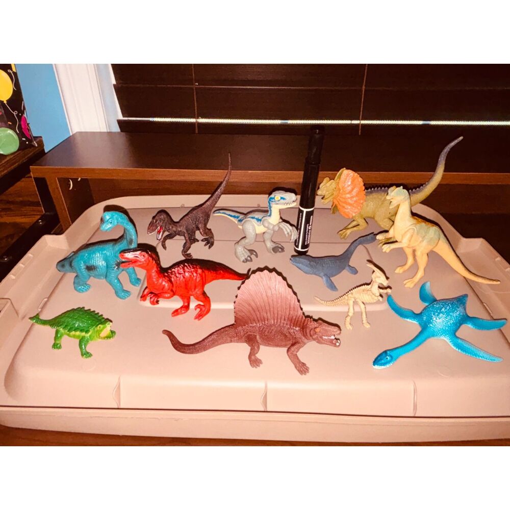 Dinosaur toys variety including "Blue"